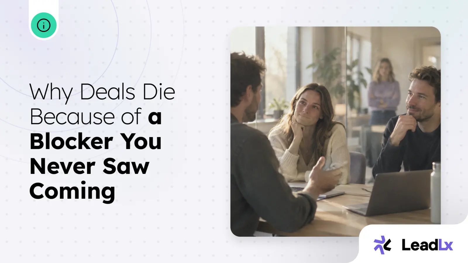 A sales rep talking with two colleagues at a meeting table while a fourth colleague stands apart in the background with arms crossed